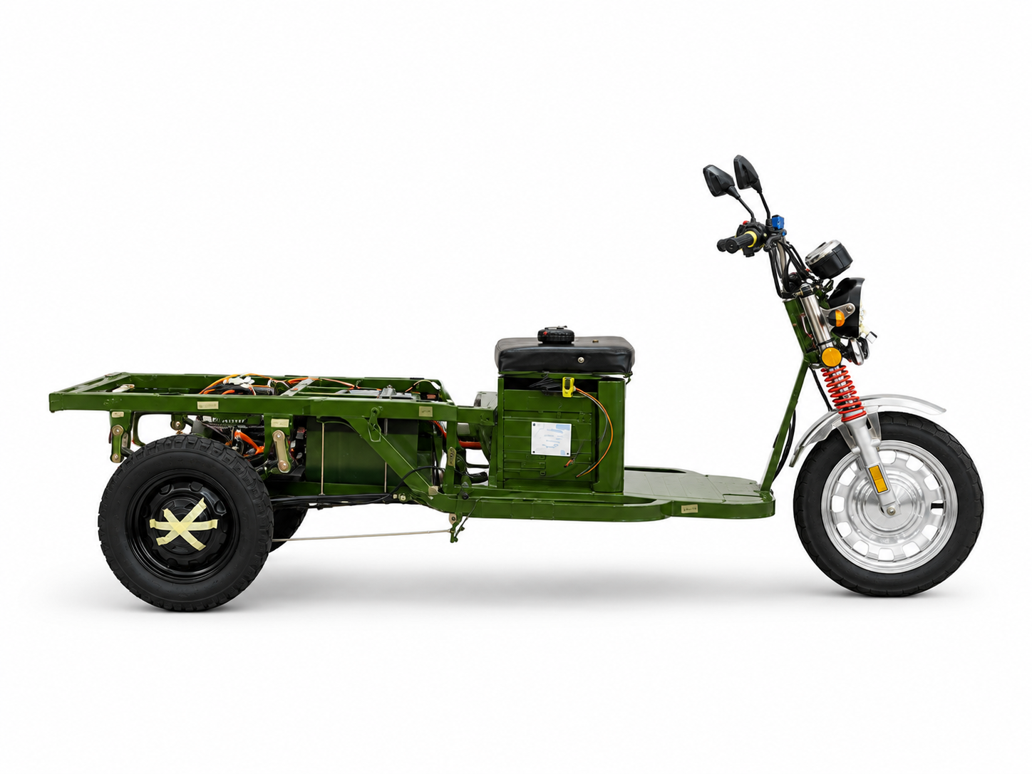 Side profile of the original green open-frame Tukzie, with its running gear fully exposed along the length of the chassis.