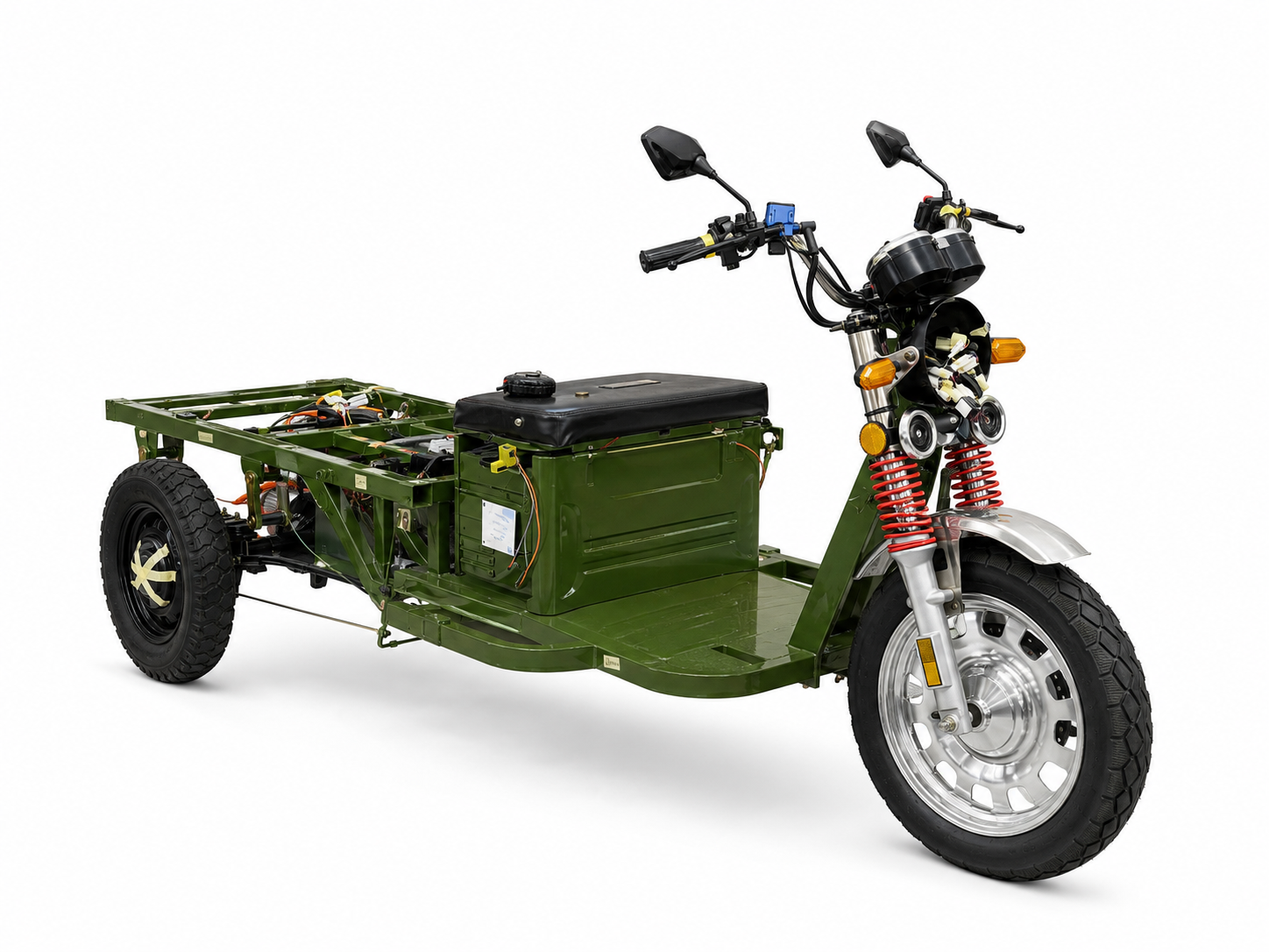 Three-quarter front view of the original Tukzie, showing the exposed battery bay, open chassis and rear cargo platform.